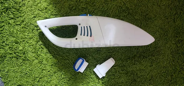 My handheld vacuum cleaner - compact, includes two attachments