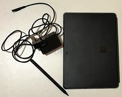 Microsoft Surface Go 3 tablet with Surface Pen and charger