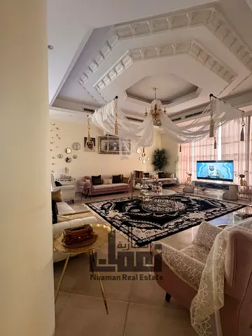 Villa for sale in Al-Rahmaniyah. The villa is 10 years old, with an area of 16,000 sq. ft., 7 master bedrooms. Price: 3,500,000 AED.