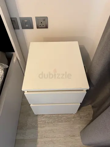 White two-drawer nightstand in good condition