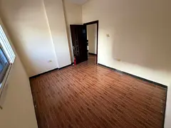 One bedroom and living room for annual rent in Al Rashidiya, Ajman, next to Nesto Market and close t