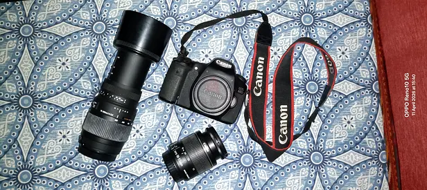 Canon DSLR 60D + 18-55 mm Cannon + 70-300 mm Sigma Lense with Strap + Bag + Battery with charger
