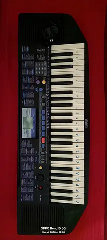 My Yamaha 61-key portable electronic keyboard — working, with power adapter
