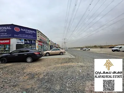 Residential land for sale in Al Yasmeen, Ajman, corner plot on two streets, prime location near the main road, excellent area at a great price, ideal