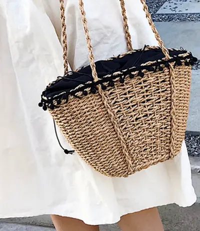 Zara Woven straw shoulder bag with black lining — lightly used