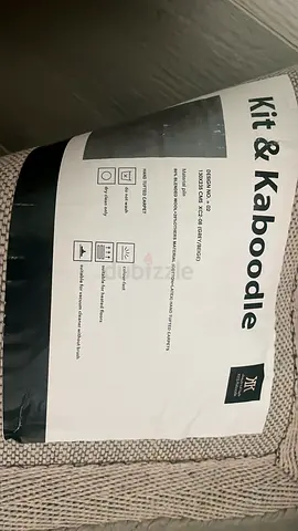 2 Kit  Kaboodle beige textured rug - gently used