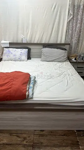 Grey wooden bed frame with mattress - good condition