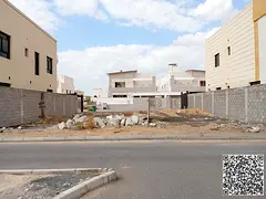 Residential villa land on two streets (front and back) at a bargain price in Al Alia area.