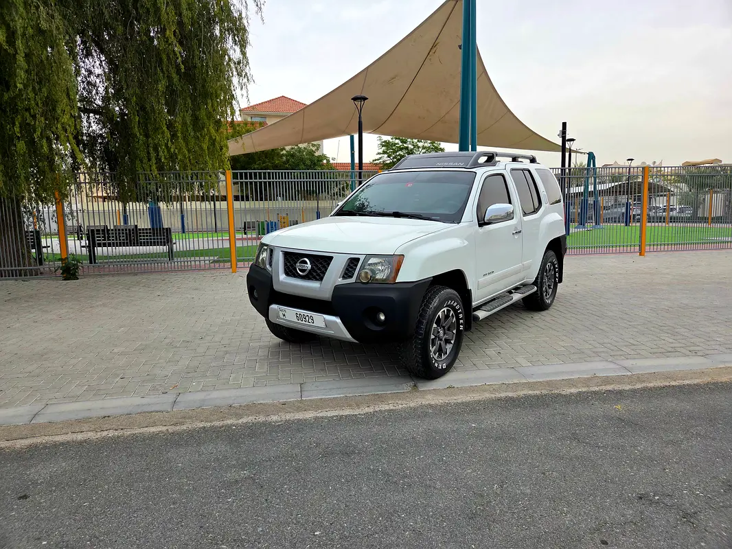 Nissan Xterra 2014 — photo 1 of 18