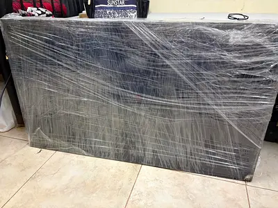 Large flat-screen TV (wrapped) - good working condition