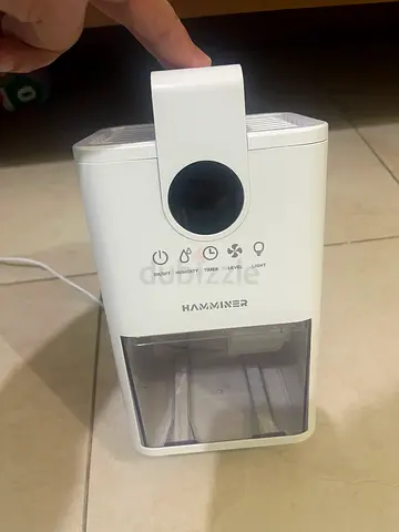 Compact white dehumidifier - perfect working condition