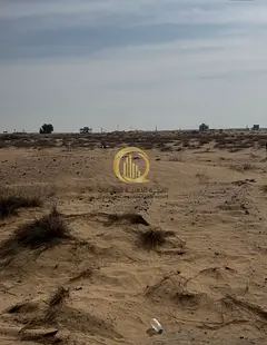 For sale in the Emirate of Sharjah: a residential and commercial land in the Al Qurtas district with