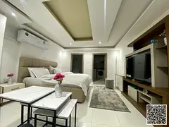 Furnished studio apartment with hotel-style furnishings for monthly rent in Ajman - Ajman Corniche -
