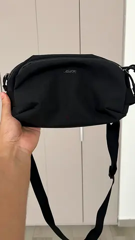 Black compact TECH crossbody sling bag from BELLROY - lightly used