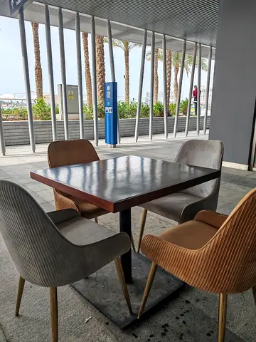 Restaurant Table with Elegant Chairs