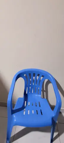 4 Blue plastic stackable chair — good condition