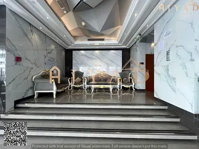 For rent: 2 bedrooms hall apartment in Al Nuaimiya 3 Ajman, first occupancy, near Dubai Islamic Bank, 2 bathrooms, central AC, free parking