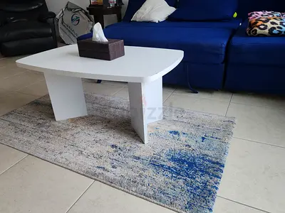 White coffee table with Handcrafted rug