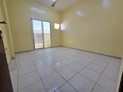 For annual rent in Al Rawda 3 Ajman, a two bedroom apartment with living room located on Sheikh Amma