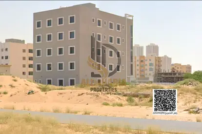 🏷️ أرض للبيع في العالية – جلوبال سيتي | سكني تجاري | تصريح G+4  Writing