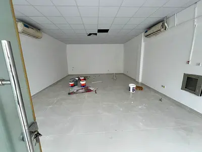 Shop for rent in Al Rawda 1 near Hamidiya Police Station split AC AED 40,000 in 4 payments prime location
