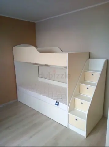 Kids bunk bed with storage stairs
