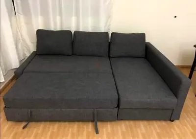 My grey L-shaped sofa bed — pull-out, good condition