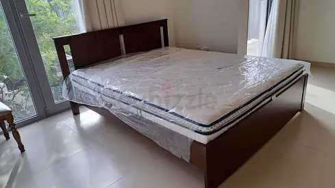 Wooden Bed with 2 Mattress — Good Condition