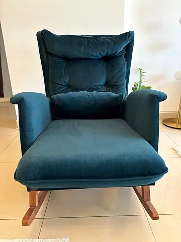 Teal velvet lounge armchair with wooden legs