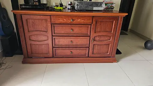 Solid wooden table / sideboard with 4 drawers and 2 cabinets. Very strong wood.