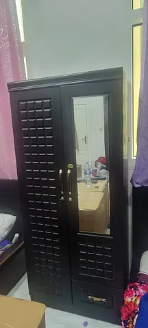 2 For 700 Aed Dark wooden wardrobe with mirror and drawer - used, good condition