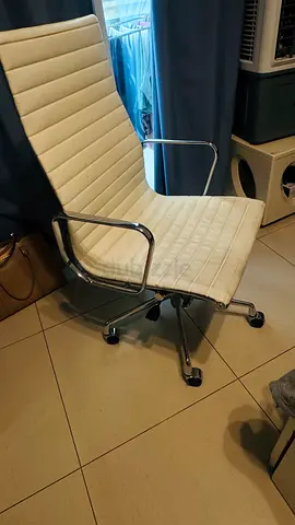 White Eames-style swivel office chair — used, good condition
