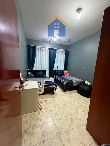 For sale: Three bedrooms with parking space, rear view, Al Majaz 3