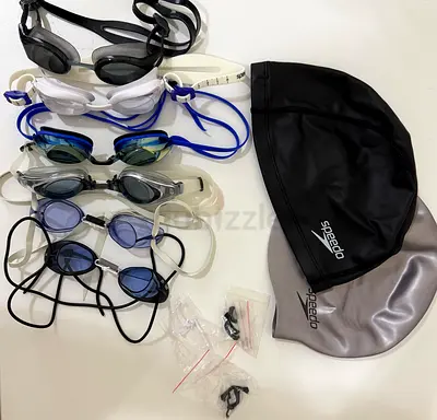Swimming goggles and caps