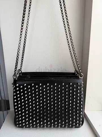 Christian Louboutin Triloubi spiked clutch