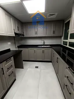 Two bedrooms and a living room with parking for sale in Al Khan area