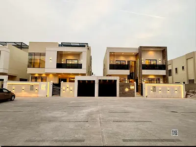 Own your dream villa, two floors and a roof, in Al Helio 2 area on Sheikh Mohammed Bin Zayed Road, directly from the owner, no down payment, bank financing available.