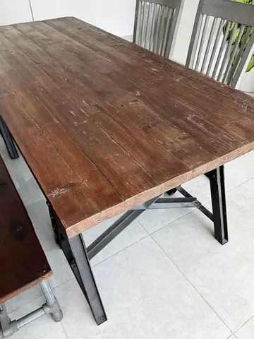 Dinner table with chairs and bench