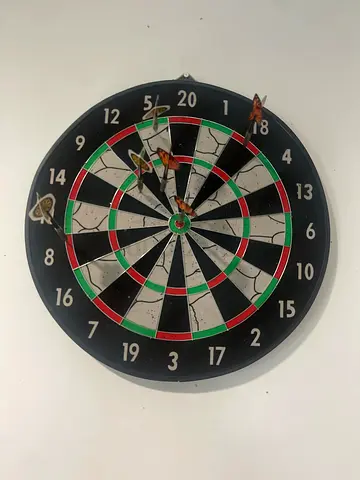 My used dartboard with darts — working condition