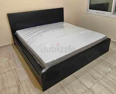 IKEA malam king‑size bed (180 × 200 cm) with 2 storage drawers underneath and an IKEA mattress