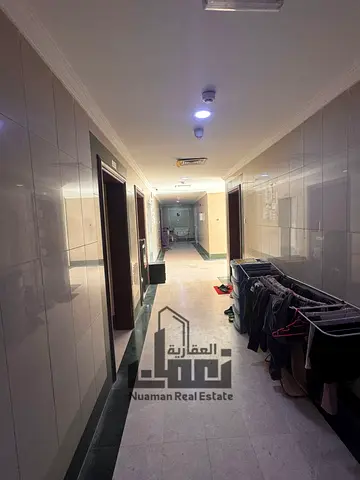 For investment, a building for sale in Muwaileh, Sharjah. Price: 9,000,000 AED. Building age: 10 years. Annual income: 700,000 AED.