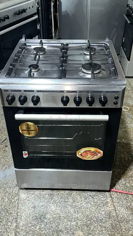 Stainless steel 4-burner gas cooker with oven — used, working