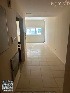 For sale: 2BR hall apartment in Ajman One Towers Al Rashidiya 3, 3 Bathrooms, new building, built-in