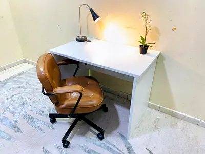 My compact white study desk — great for home office