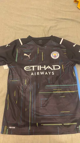 Signed Man City Shirt by Ederson
