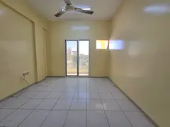 Two-bedroom apartment with a living room for annual rent – ​​Rawda 3 – on Sheikh Ammar Stree