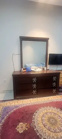 Dark wood dresser with mirror — 6 drawers, good condition