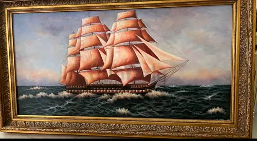A large framed oil painting of a three-masted sailing ship