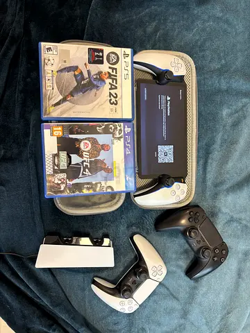 My PS5 DualSense controllers + PlayStation Portal handheld, charger and 2 games (FIFA 23 PS5, UFC 4)