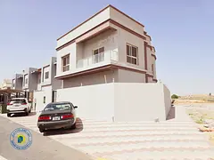 Corner villa for sale in Al Zahia, 5 bedrooms, with electricity, water, and AC. Bank financing. Free